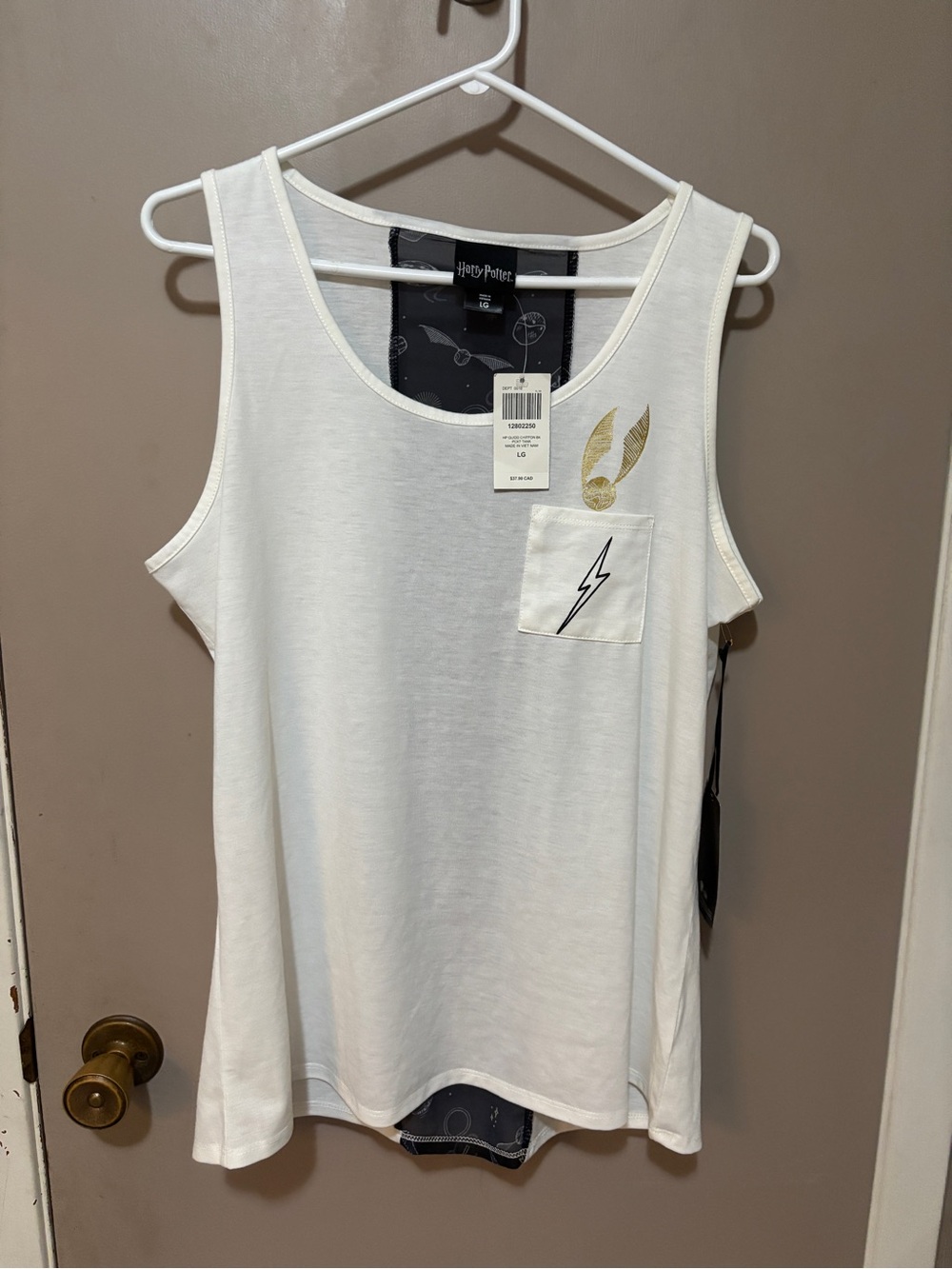 Warner Bros. White Tank Top with Gold Accent and Black Lightning Pocket